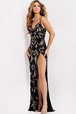 front of high slit black gold dress