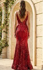 Back view of fitted sequin gown with deep V back, thin straps, and intricate leaf pattern embellishments