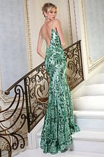 mint rose gold sequin prom dress with slit - back view, looking over shoulder blonde updo ornate staircase