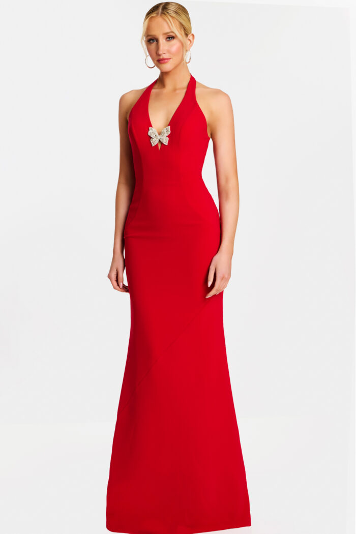 Front view of red halter evening gown with embellished bow detail