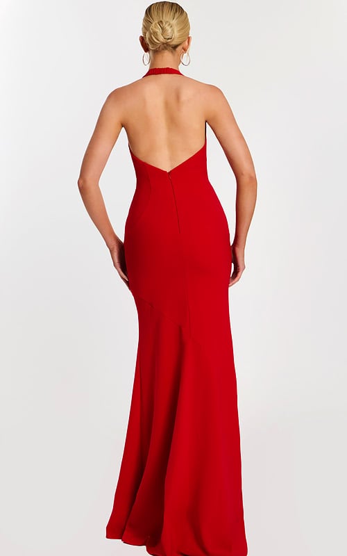 Back view of low-cut halter red gown with zipper detail