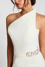 Close-up of the structured one-shoulder neckline and upper bodice detail