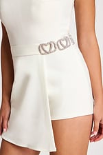 Side view of the rhinestone heart belt and asymmetric overlay skirt
