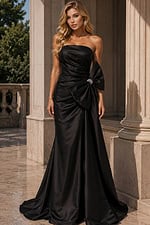 satin formal dress with thigh-high slit, ruched bodice, and dramatic side bow accent