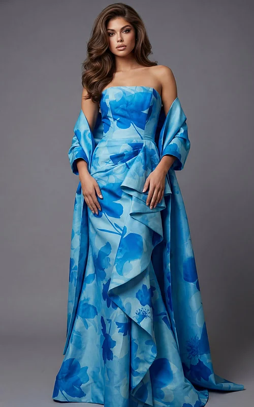 Front view of strapless printed gown with structured bodice, cascading ruffle detail, and matching draped wrap