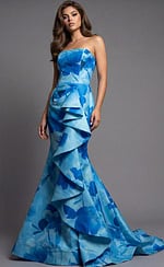 Front view of strapless printed gown with fitted bodice, sculpted waist, and cascading ruffle skirt