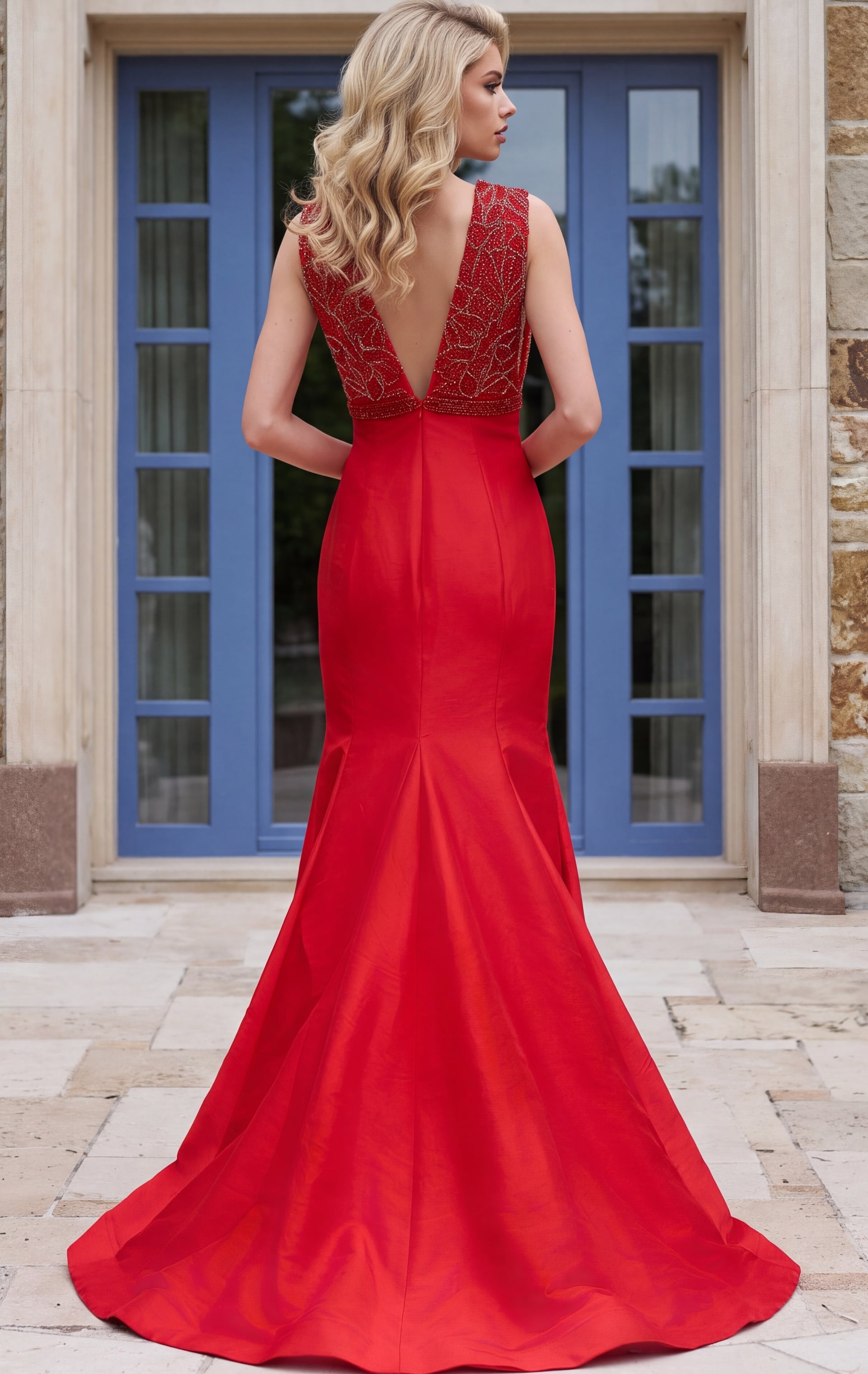 back view of red taffeta mermaid gown with open V back