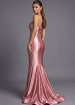 Pink satin fitted gown with structured bodice and flared hem
