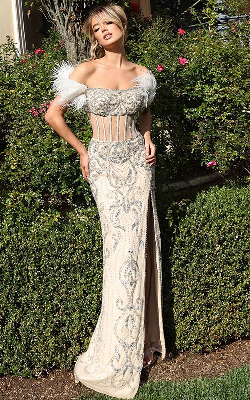 Model wearing sheer corset gown with beaded pattern and side slit