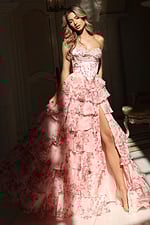 Elegant printed gown with cascading ruffled skirt and fitted corset