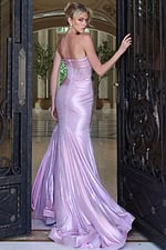 rose metallic gown with rhinestone accents and slit - three quarter view, blonde updo, looking back, gate