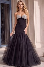 Black strapless mermaid gown with a crystal-embellished sweetheart neckline, structured corset bodice, and dramatic layered tulle skirt.
