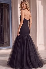 Elegant black formal dress featuring a sparkling beaded bust, fitted corset waist, and voluminous mermaid silhouette with a soft tulle hem.