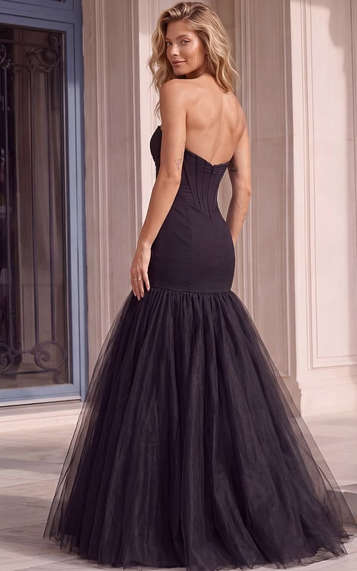 Elegant black formal dress featuring a sparkling beaded bust, fitted corset waist, and voluminous mermaid silhouette with a soft tulle hem.