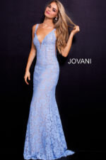 Model showcasing Jovani 48994 in blue lace, front angle.