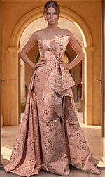champagne and gold brocade strapless A line gown with peplum and overskirt