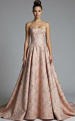 strapless evening gown with structured corset back and flowing skirt