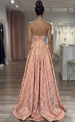 strapless formal gown highlighting structured bodice and flowing skirt volume