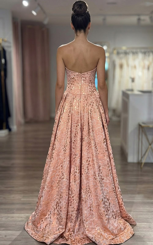 strapless formal gown highlighting structured bodice and flowing skirt volume