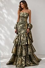 Strapless metallic floral evening gown featuring a fitted silhouette, layered peplum tiers, and dramatic cathedral-length train.