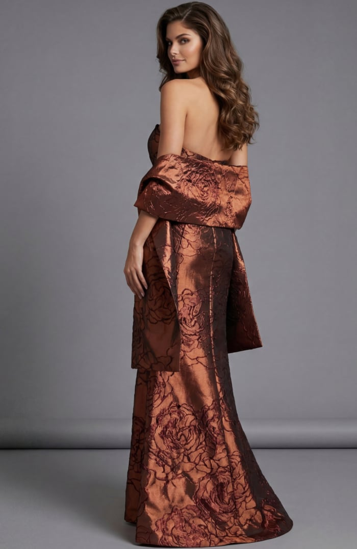 Back view of strapless brocade gown with bow detail and long skirt