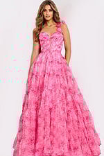 Pink ruffled ball gown with lace up back