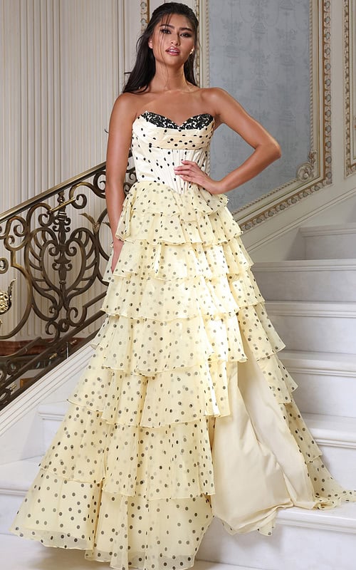 champagne strapless polka dot tiered gown - front full body, hand on hip staircase direct gaze