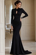 black formal dress featuring an open back, long sleeves, and floor-length train