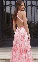 Floral pleated evening dress with open back and crossed straps flowing into a soft A line skirt