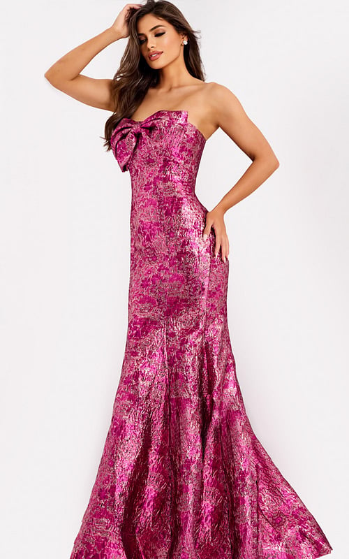 Metallic pink strapless prom dress with bow detail