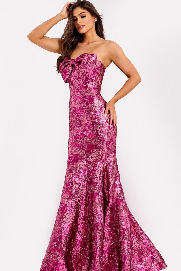 Metallic pink strapless prom dress with bow detail