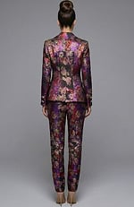 Back view of floral jacquard suit with structured jacket and slim pants