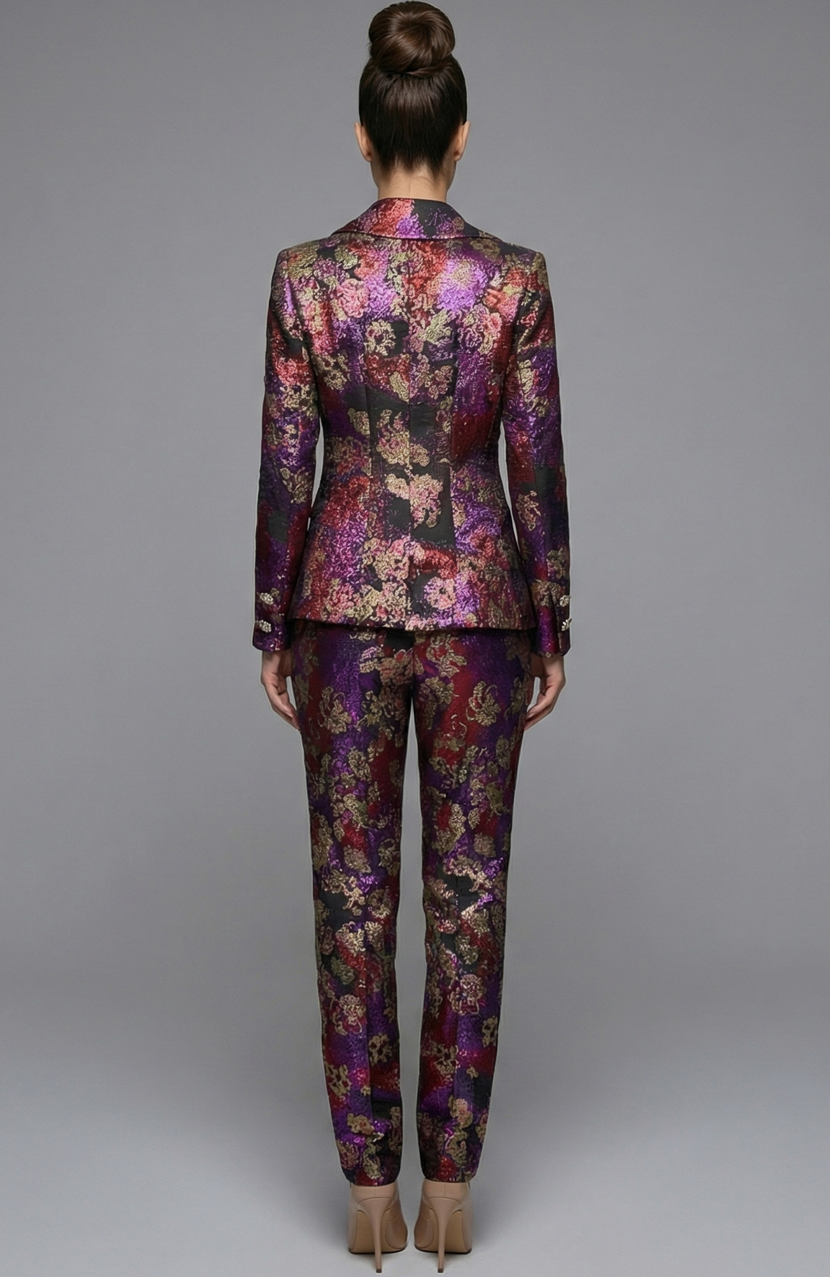 Back view of floral jacquard suit with structured jacket and slim pants