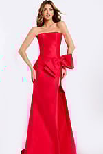 Red evening dress featuring large bow detail