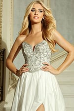 Flowing formal dress featuring crystal-embellished bodice and satin skirt
