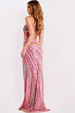 Asymmetric pink sequin gown featuring high slit and open back