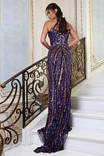 purplemulti strapless sequin gown with deep v and high slit - back view, looking over shoulder, train on stairs