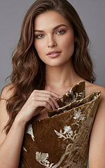 One shoulder velvet evening gown with floral brocade pattern shown from the front