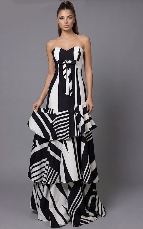 Chic strapless designer gown with striking geometric print and layered hem