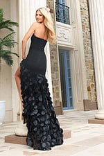 Black formal gown with dimensional dot embellishments and side