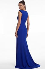 Back view of a fitted gown with clean lines and flowing floor length finish