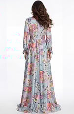 Back view of floral long sleeve chiffon gown with flowing skirt and soft drape