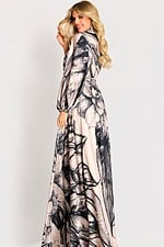 Long-sleeve maxi dress with a high neckline and bold botanical print, featuring a flowy silhouette and soft drape.
