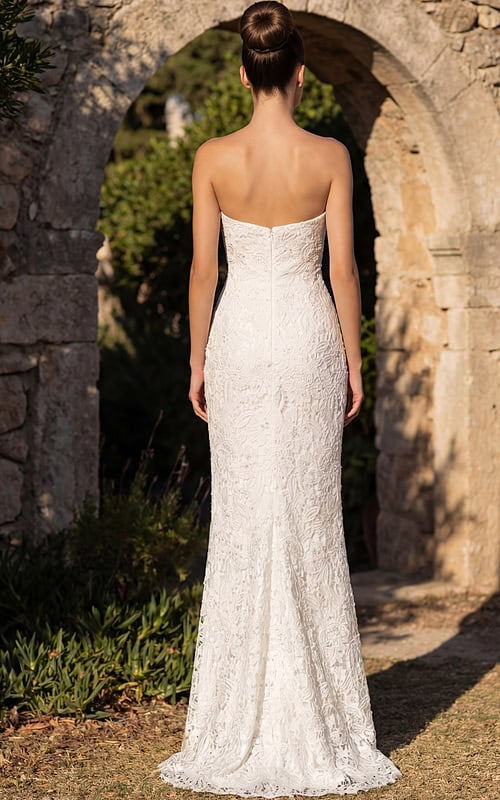 Back view of strapless lace wedding gown with smooth fitted finish