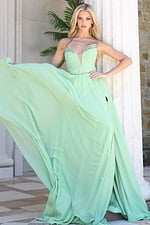 mint strapless coral chiffon a-line gown - front full body, skirt fanned out, hand on hip, leaning pillar