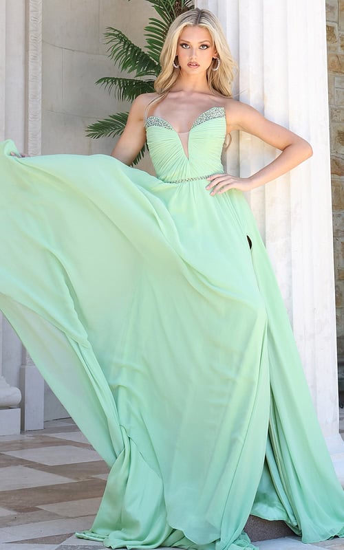 mint strapless coral chiffon a-line gown - front full body, skirt fanned out, hand on hip, leaning pillar