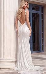Elegant white formal dress with a body-hugging silhouette, a thigh-high front slit, and a sweeping train in all-over sequins.