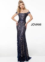 Model wearing Jovani 49634 navy lace dress, full front view.