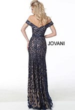 Model wearing Jovani 49634 navy lace dress, back view with open back.