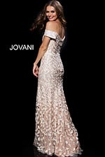 Model wearing Jovani 49634 gold lace dress, back view.